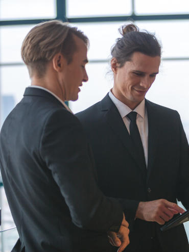 Founder Neill Brookman speaking with a client